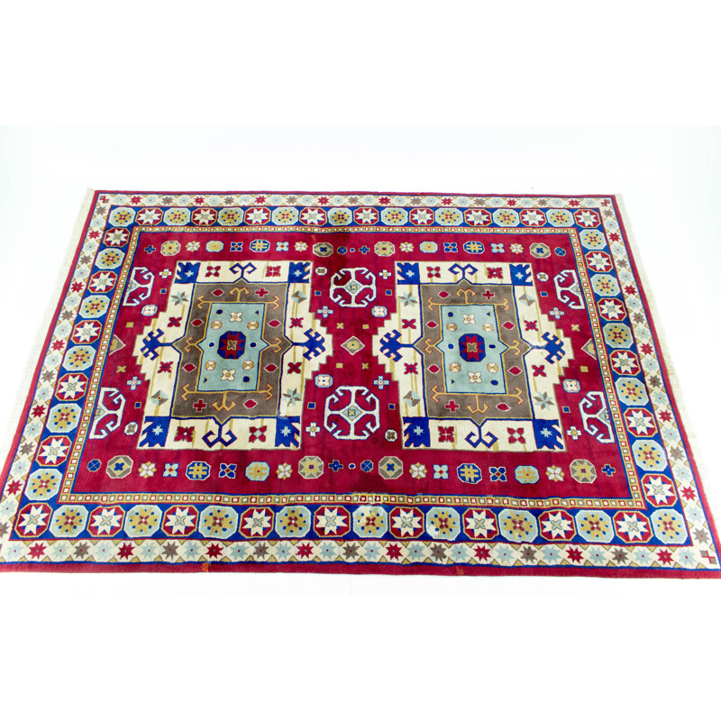 Hand-knotted vintage Kazak rug with geometric patterns, 1960