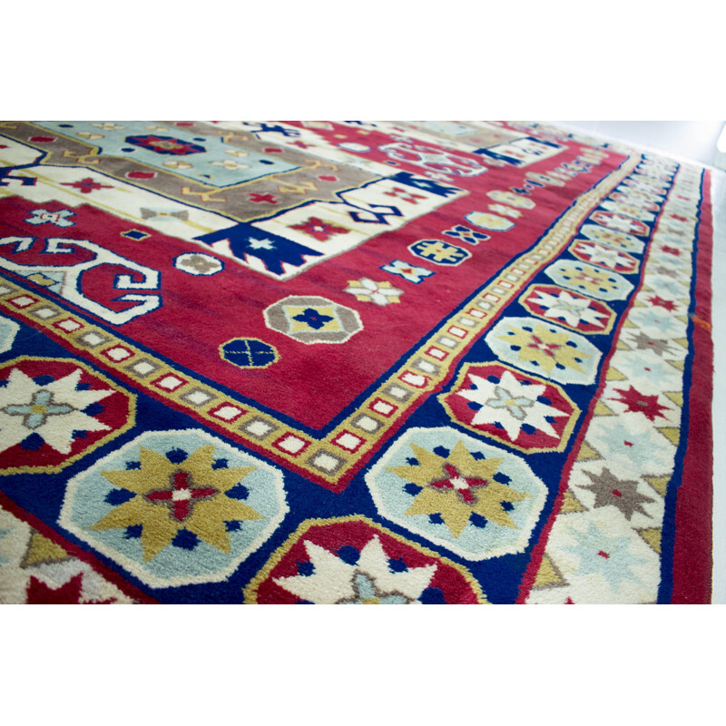 Hand-knotted vintage Kazak rug with geometric patterns, 1960