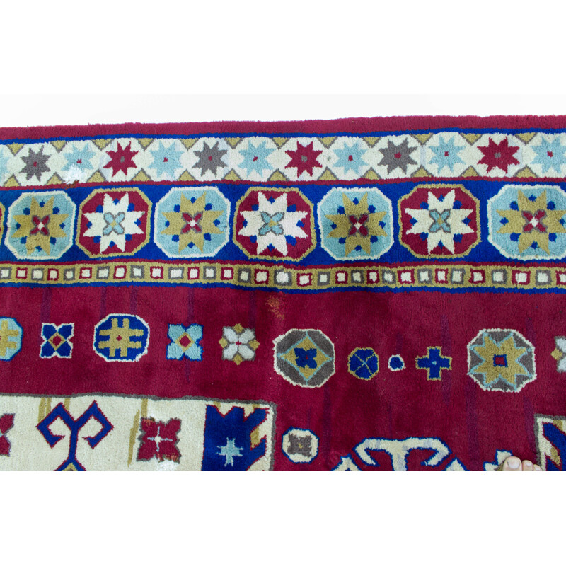 Hand-knotted vintage Kazak rug with geometric patterns, 1960