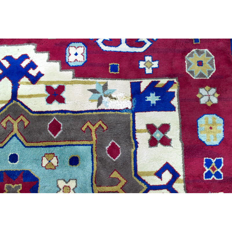 Hand-knotted vintage Kazak rug with geometric patterns, 1960