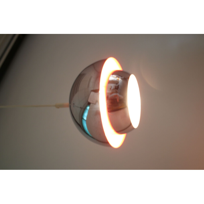 Chrome hanging lamp with orange interior