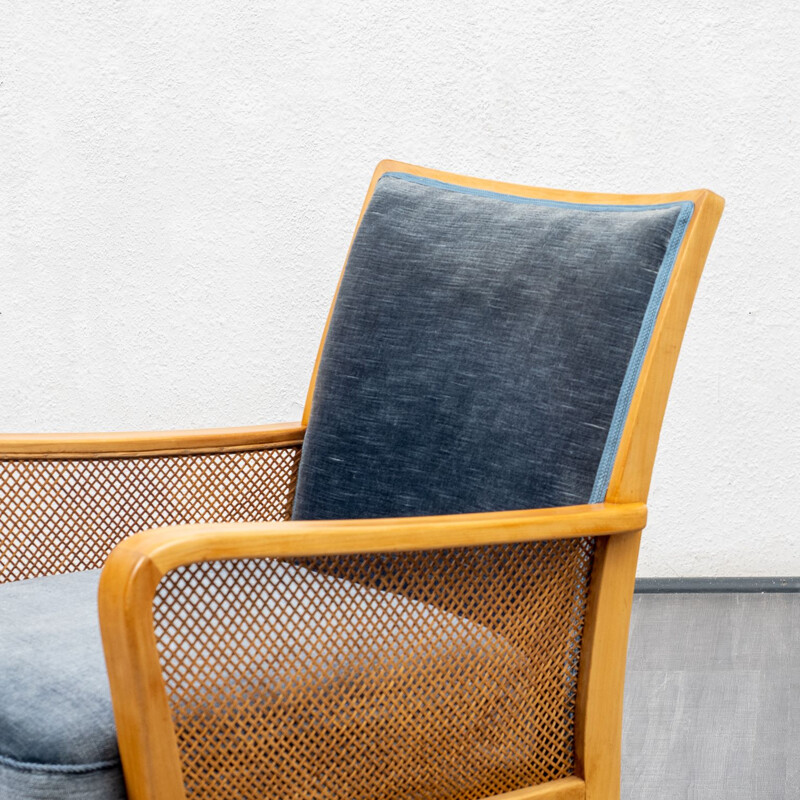 Vintage cherryvwood armchair with bast armrests 1950s