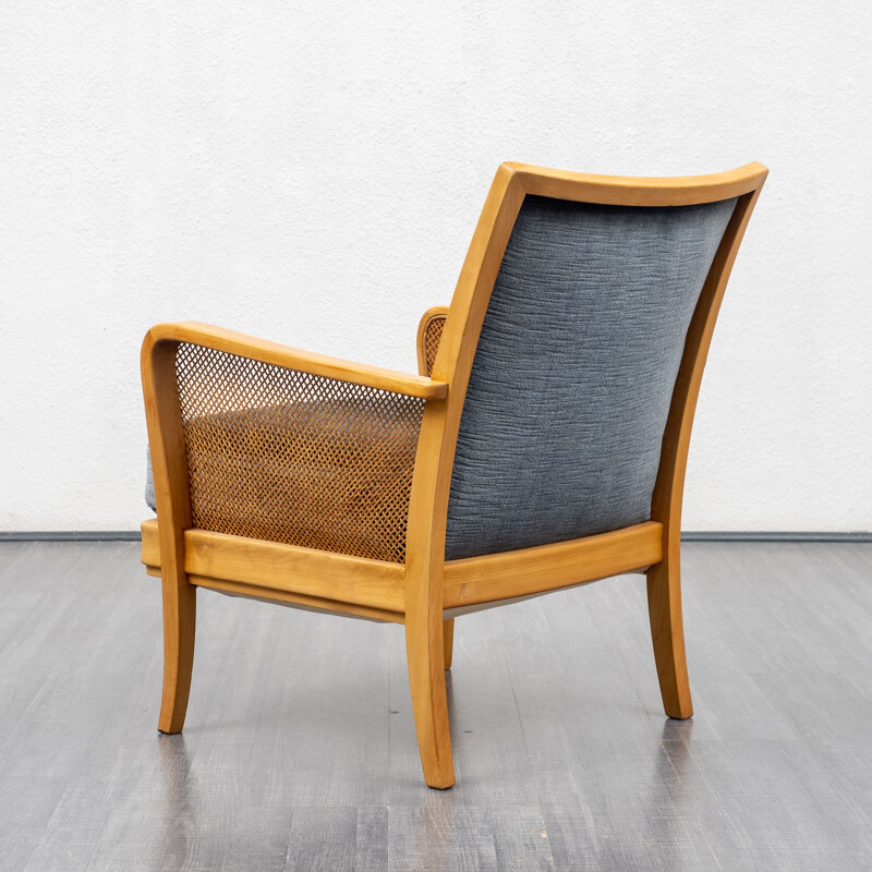Vintage cherryvwood armchair with bast armrests 1950s