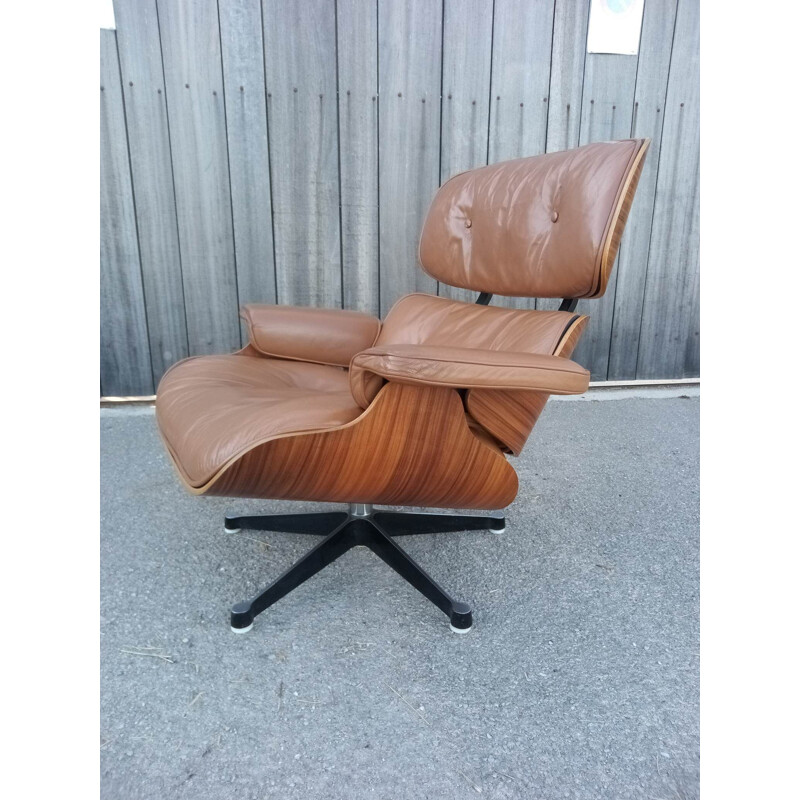 Pair of Lounge armchairs and ottomans 1960