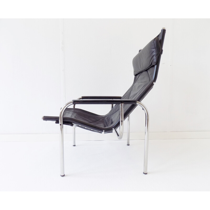 Vintage black leather armchair Strässle HE1106  by Hans Eichenberger 1960