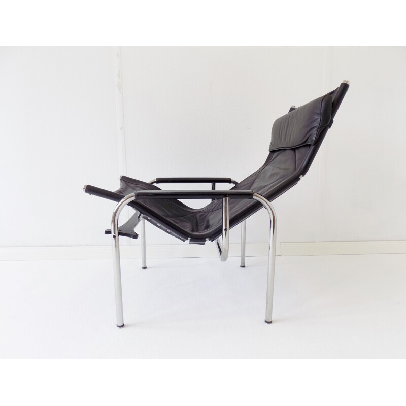 Vintage black leather armchair Strässle HE1106  by Hans Eichenberger 1960