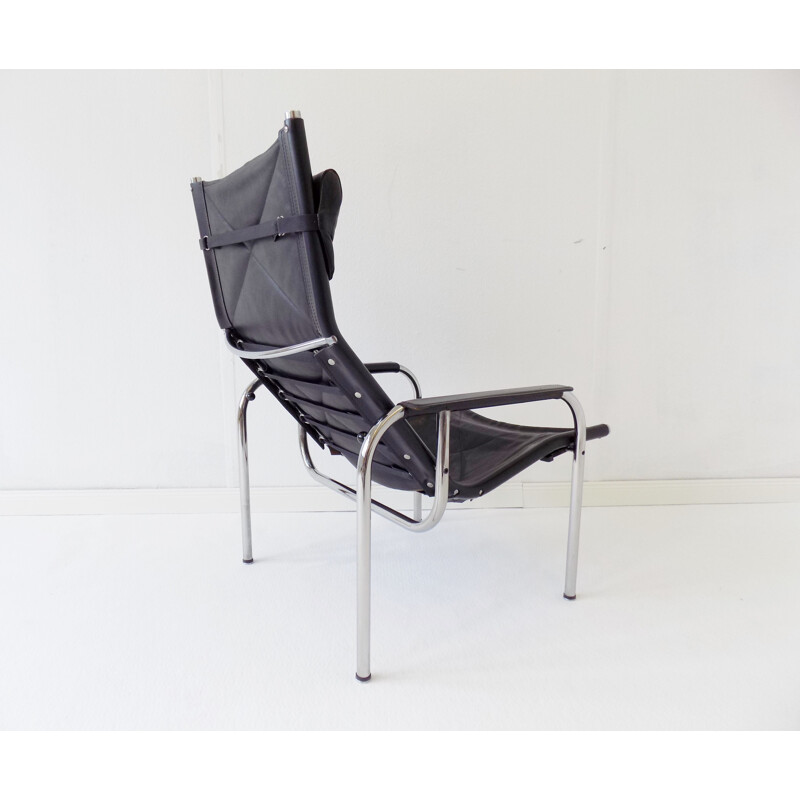 Vintage black leather armchair Strässle HE1106  by Hans Eichenberger 1960