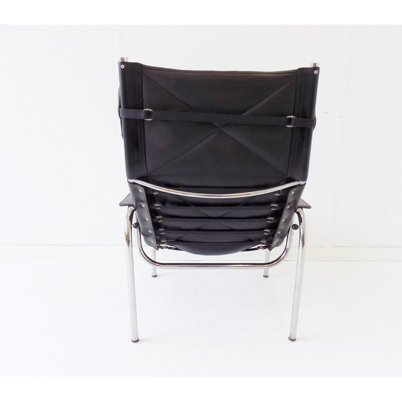 Vintage black leather armchair Strässle HE1106  by Hans Eichenberger 1960