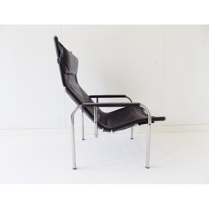 Vintage black leather armchair Strässle HE1106  by Hans Eichenberger 1960