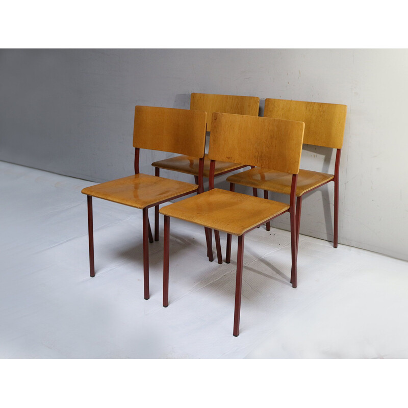 Set of 4 vintage stacking chairs with red frames 1970s