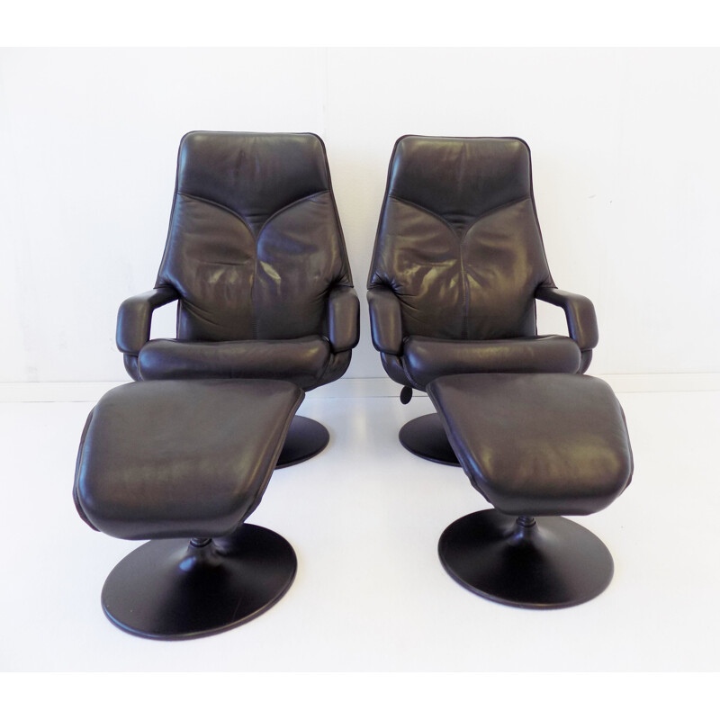 Pair of  Vintage black leather armchair with ottoman Berg Furniture 1970s