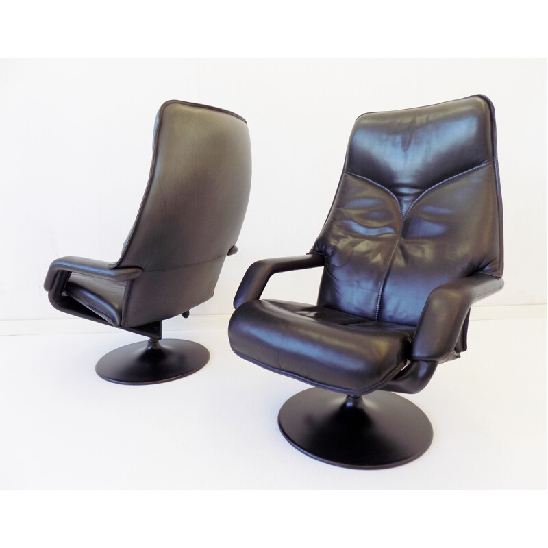 Pair of  Vintage black leather armchair with ottoman Berg Furniture 1970s