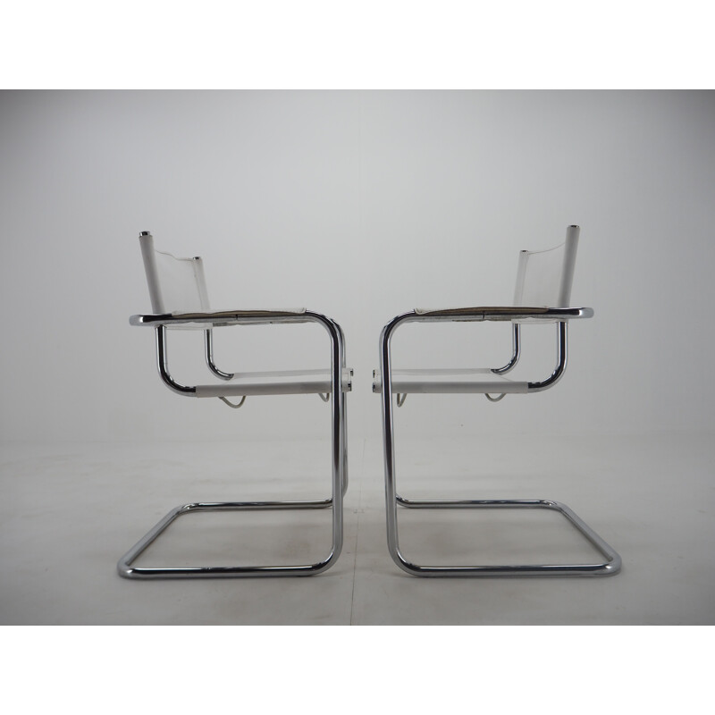 Pareja de sillones vintage de cuero cromado