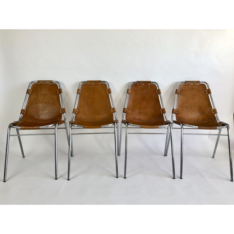 Set of 4 vintage leather chairs by Charlotte Perriand for the ski resort of Les Arcs 1960