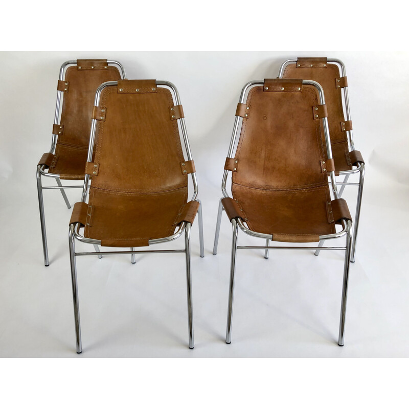 Set of 4 vintage leather chairs by Charlotte Perriand for the ski resort of Les Arcs 1960