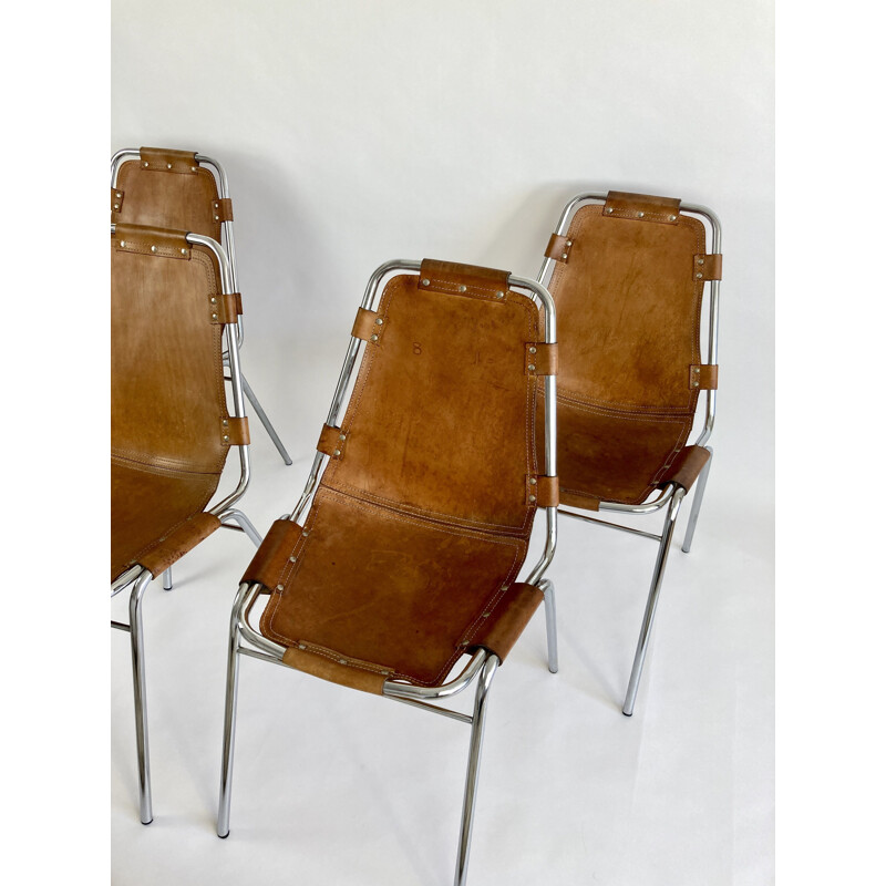 Set of 4 vintage leather chairs by Charlotte Perriand for the ski resort of Les Arcs 1960