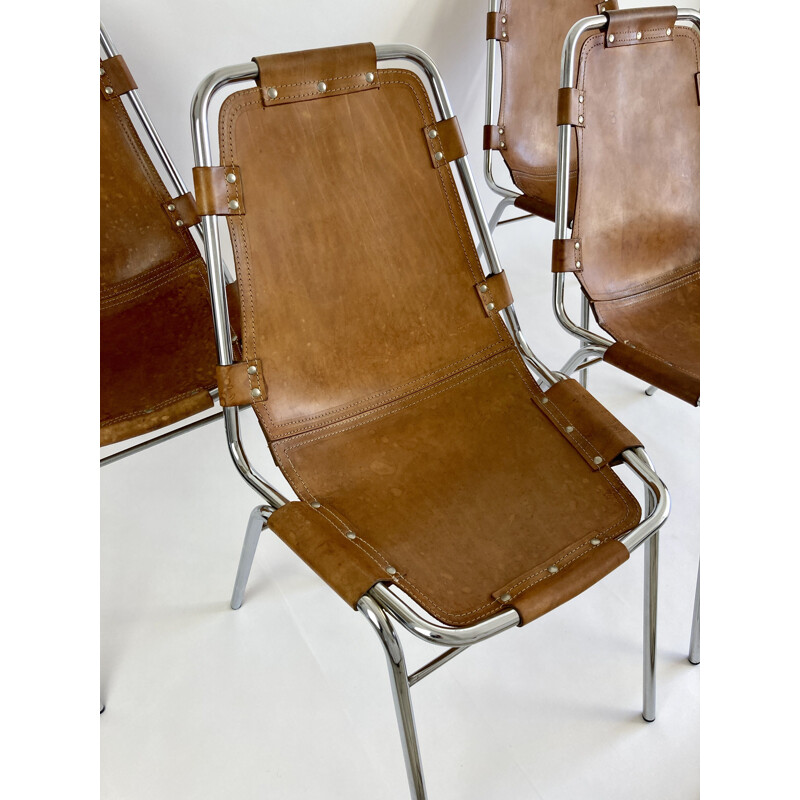 Set of 4 vintage leather chairs by Charlotte Perriand for the ski resort of Les Arcs 1960