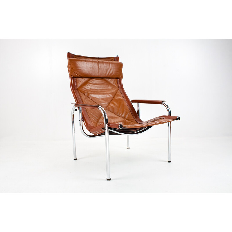 Reclining lounge chair in leather and chrome, Hans EICHENBERGER - 1970s