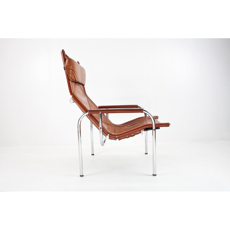 Reclining lounge chair in leather and chrome, Hans EICHENBERGER - 1970s