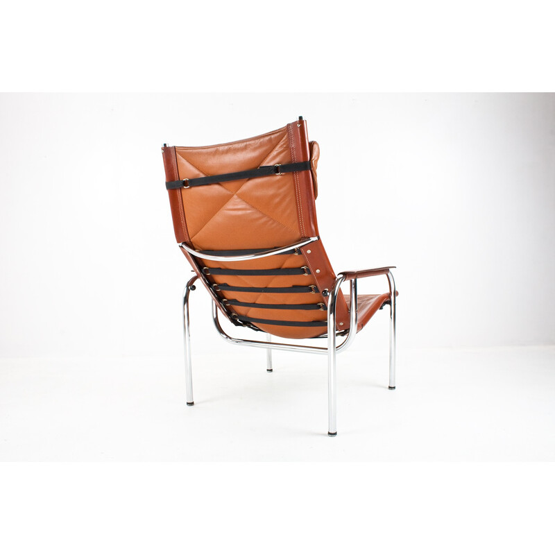 Reclining lounge chair in leather and chrome, Hans EICHENBERGER - 1970s
