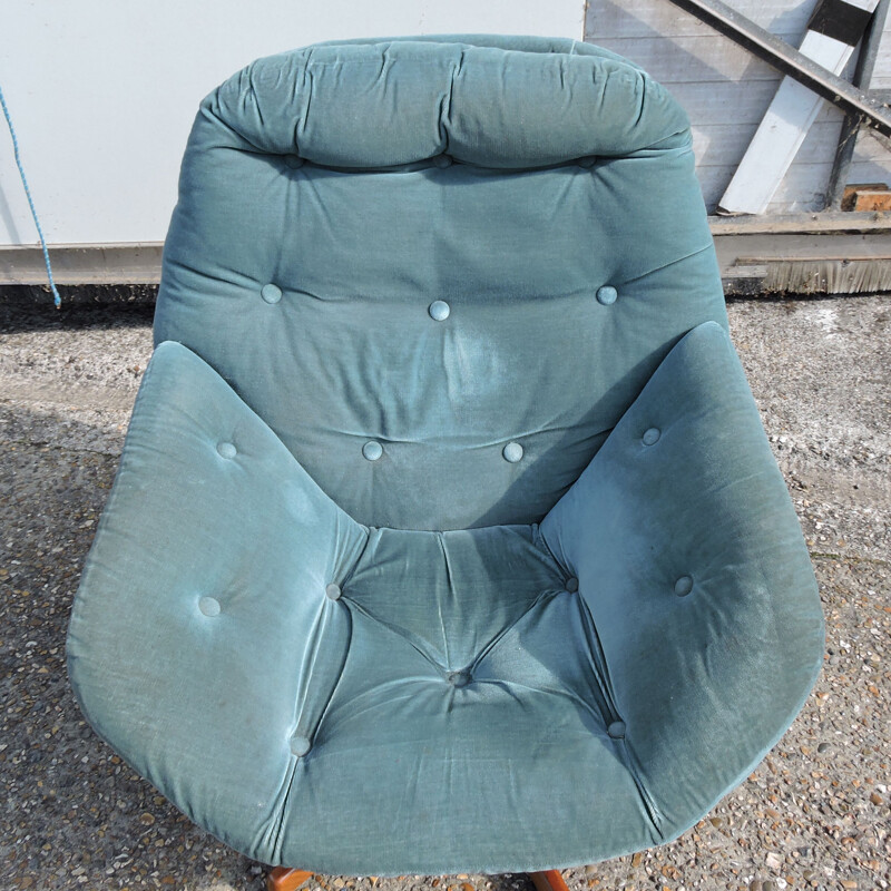 Vintage teal swivel armchair 1960