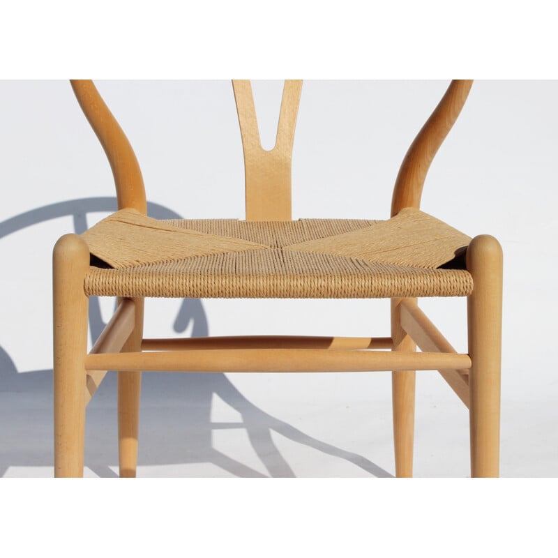 Pair of vintage Wishbone chairs of beech and papercord by Hans J. Wegner and Carl Hansen & Son in the 1960s