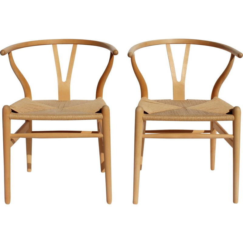 Pair of vintage Wishbone chairs of beech and papercord by Hans J. Wegner and Carl Hansen & Son in the 1960s