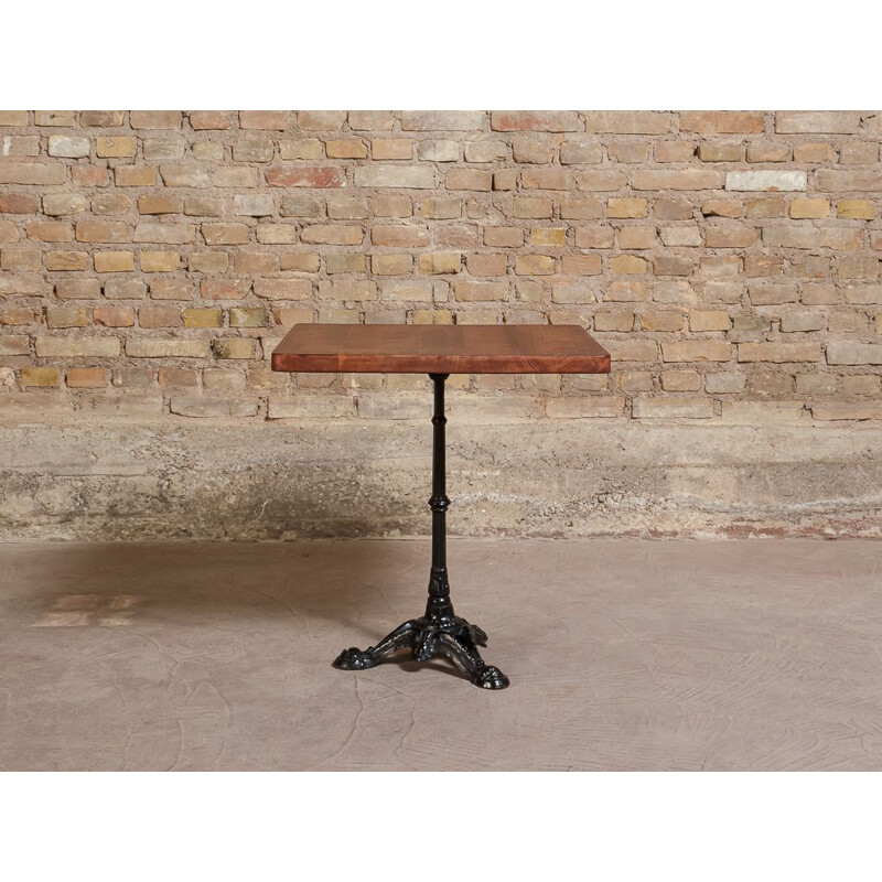 Vintage bistro table with solid stained oak square top and steel frame