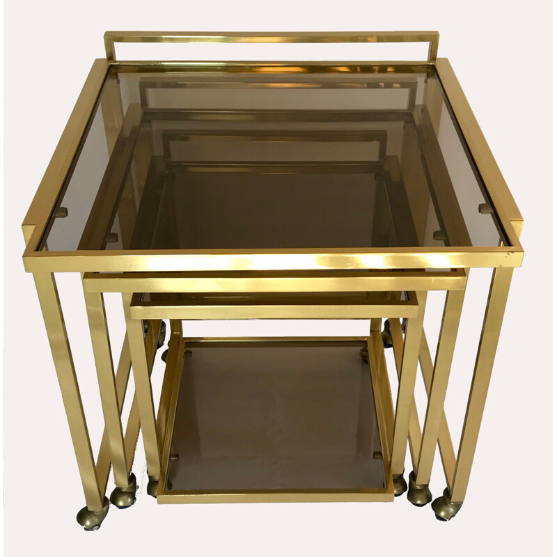 Vintage nesting tables with brass and smoked glass casters, Italy 1970