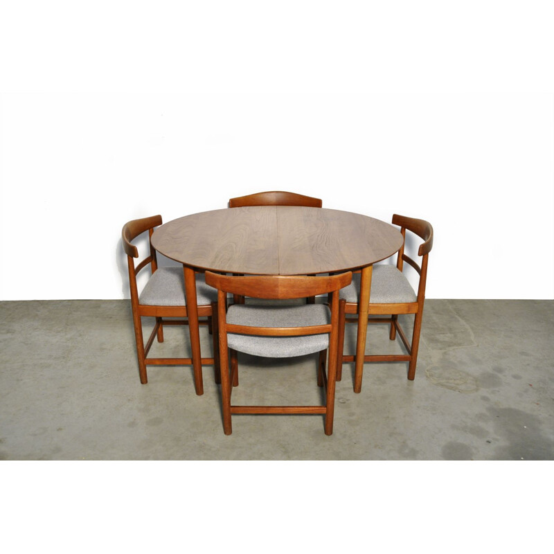 Vintage round extendable teak dining table  Danish 1950s