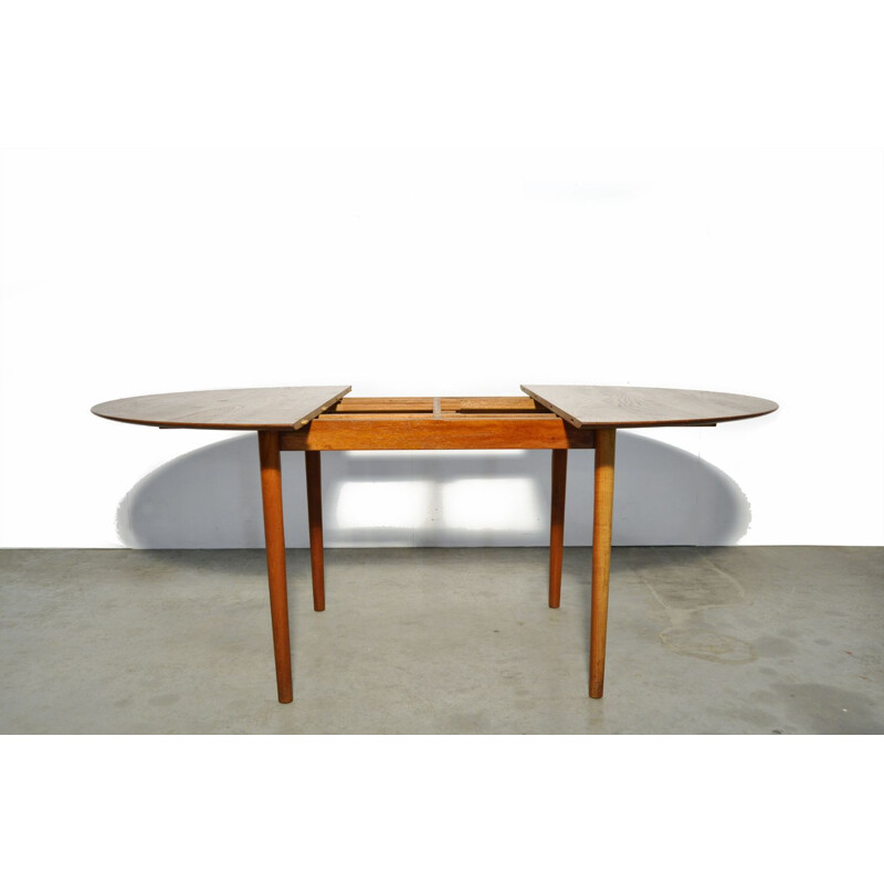 Vintage round extendable teak dining table  Danish 1950s