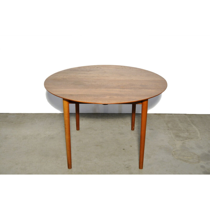 Vintage round extendable teak dining table  Danish 1950s