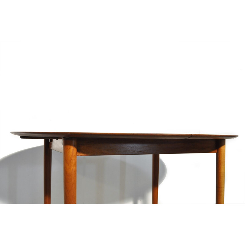 Vintage round extendable teak dining table  Danish 1950s