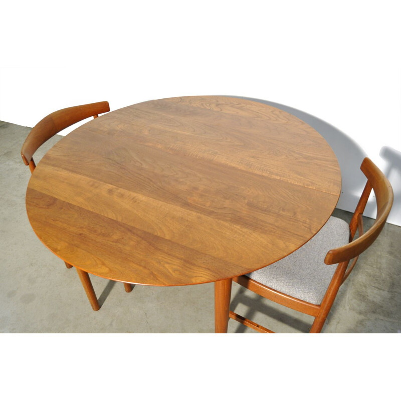 Vintage round extendable teak dining table  Danish 1950s