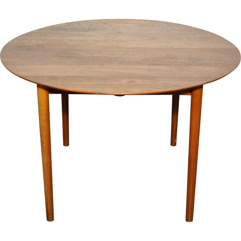 Vintage round extendable teak dining table  Danish 1950s