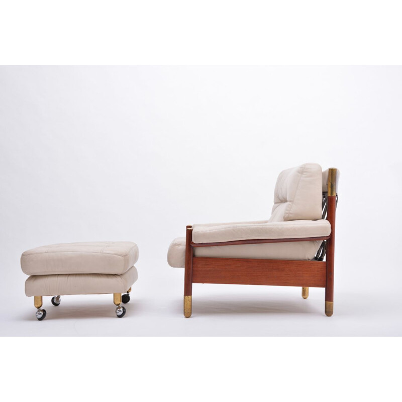 Vintage lounge armchair with Ottoman in beige leather by Carlo de Carli, Italy 1960