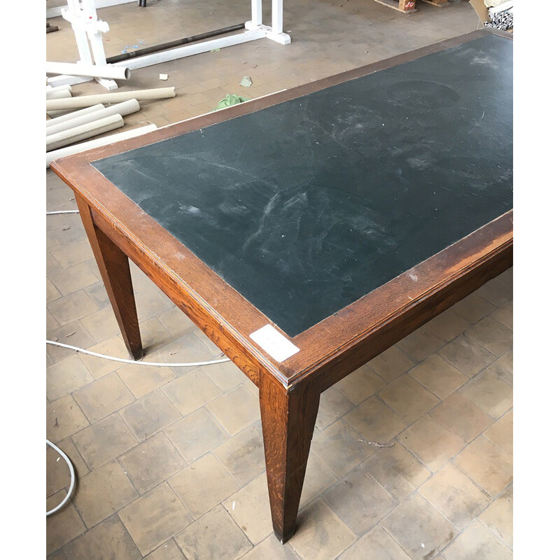 Mid-century dining table in oak and leather - 1970s