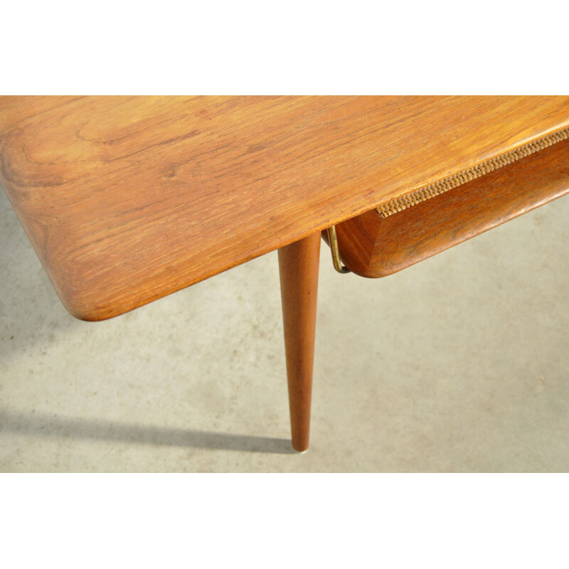 Vintage teak coffee table with cane shelf by Peter Hvidt & Orla Mølgaard Nielsen for France & Daverkosen, Denmark 1956