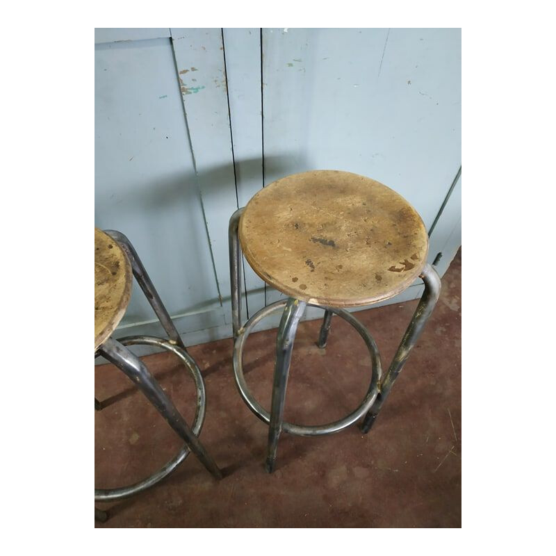 Pair of vintage brushed metal factory stools