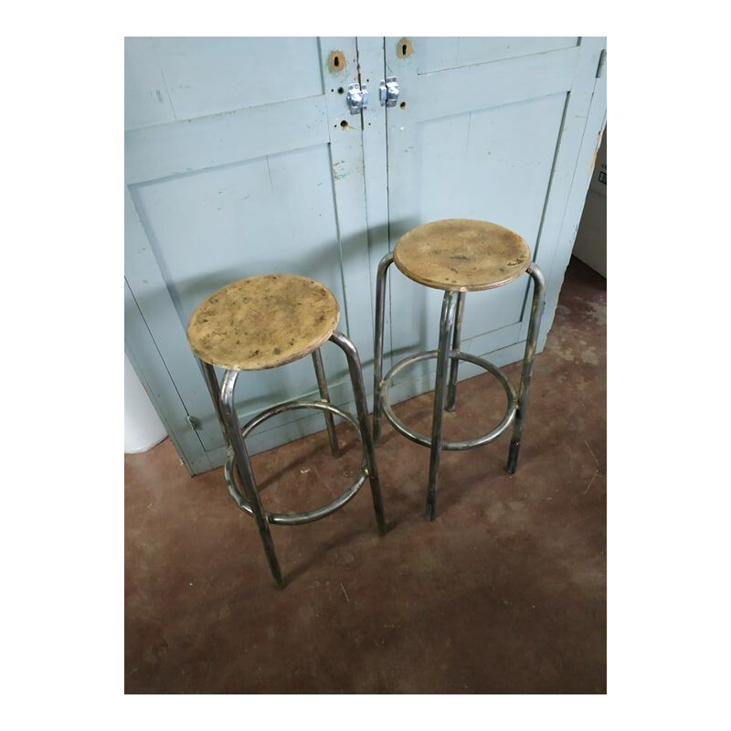 Pair of vintage brushed metal factory stools