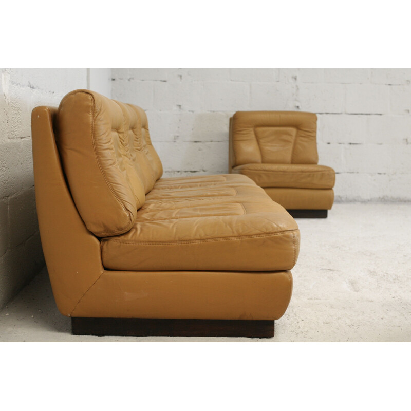 Set of sofa and pair of vintage leather chauffeuses by Jacques Charpentier in dark yellow leather France, circa 1970.