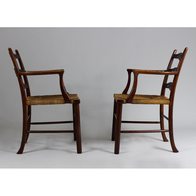 Pair of vintage oak dining chairs with woven rush seat from the first half of  20th century