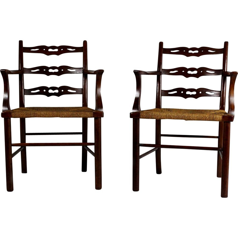 Pair of vintage oak dining chairs with woven rush seat from the first half of  20th century