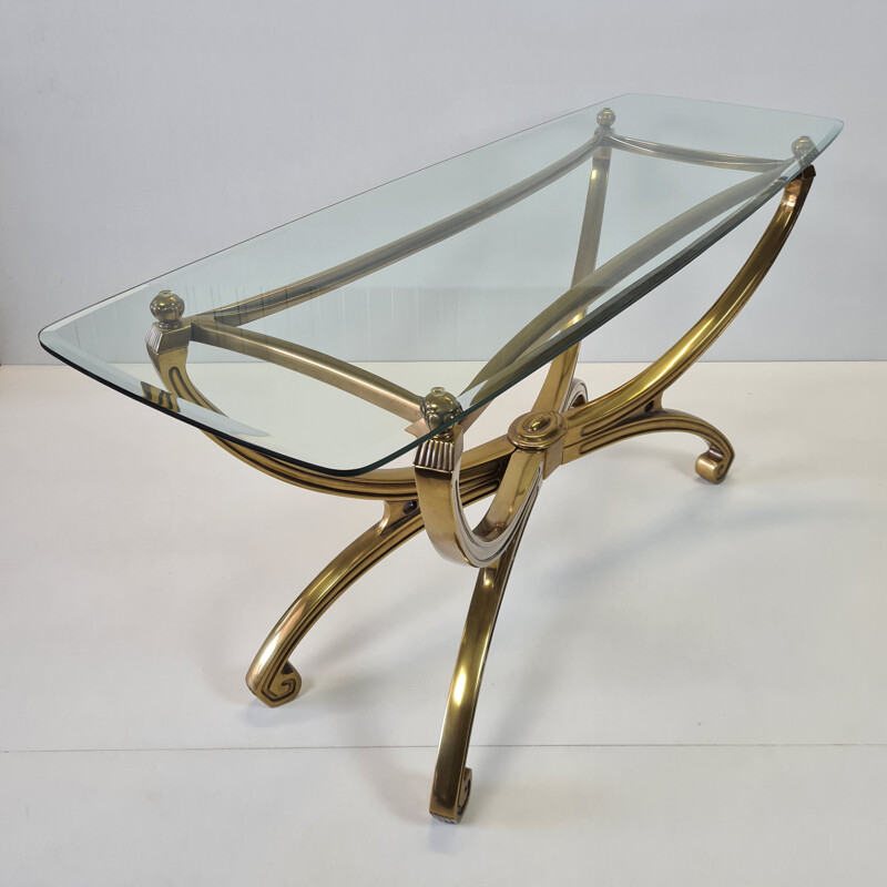 Table console vintage en laiton sculpté avec plateau en verre Français 1990