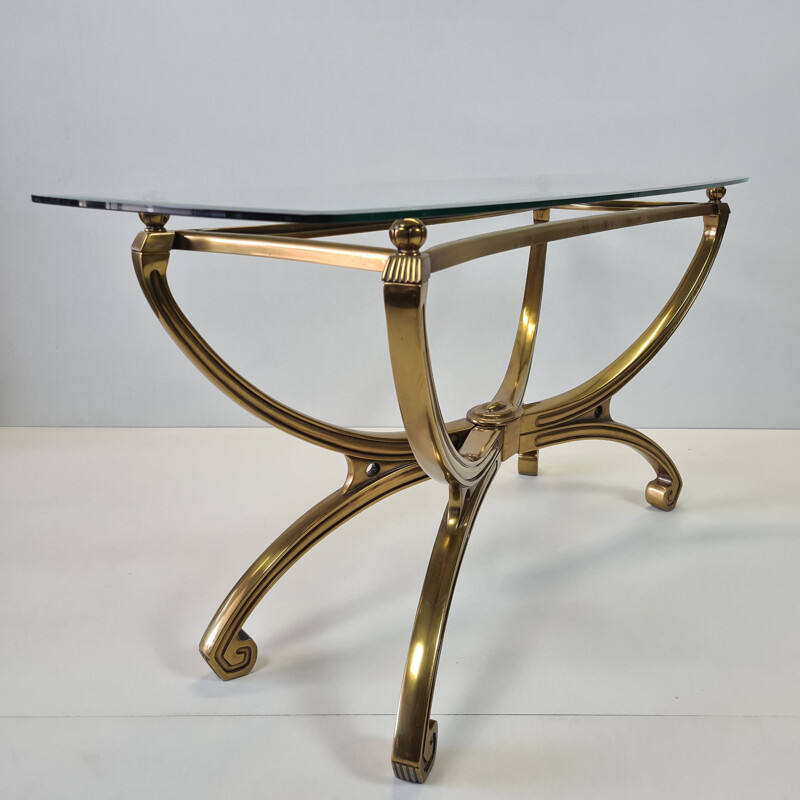 Table console vintage en laiton sculpté avec plateau en verre Français 1990
