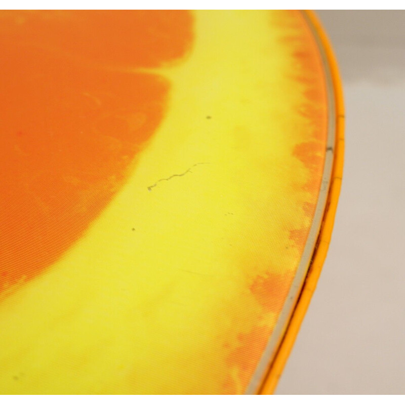 Vintage orange coffee table with glass top