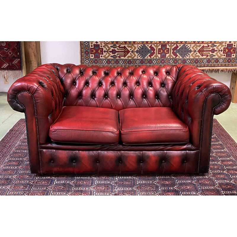 Canapé vintage 2 places Chesterfield en cuir rouge 1980