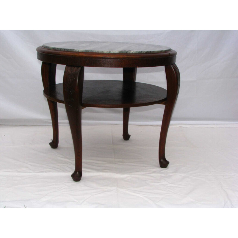 Vintage table with marble top on folded legs