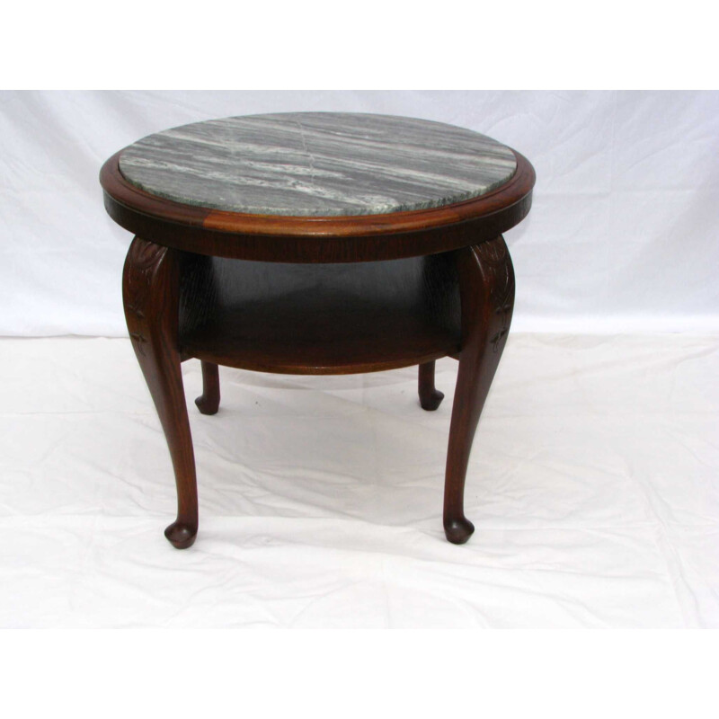 Vintage table with marble top on folded legs