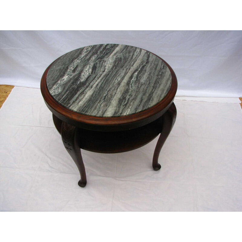 Vintage table with marble top on folded legs